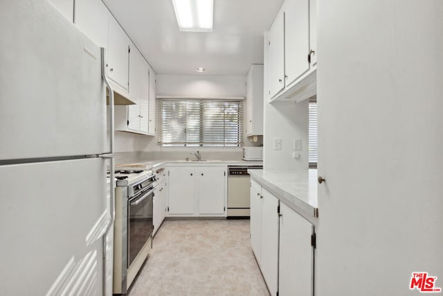 kitchen with white cabinets and white appliances