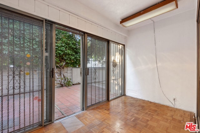 entryway featuring light parquet floors