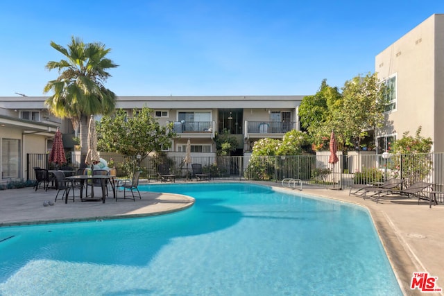 view of pool featuring a patio area