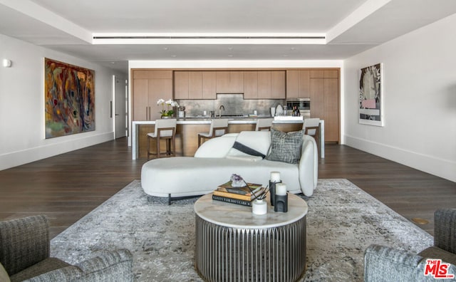 living room featuring dark hardwood / wood-style flooring