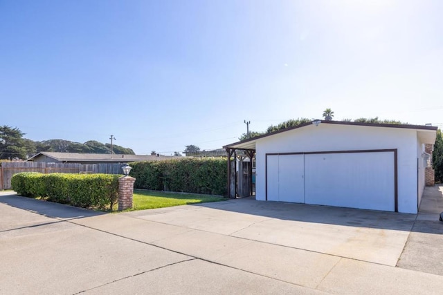 garage with a lawn