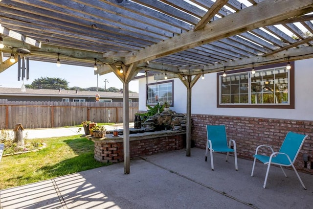 view of patio / terrace featuring a pergola