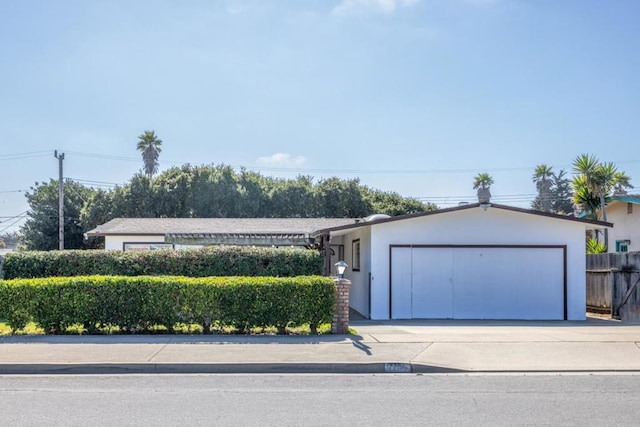 single story home featuring a garage