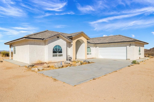 view of front of property featuring a garage