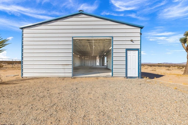 view of outbuilding featuring a garage