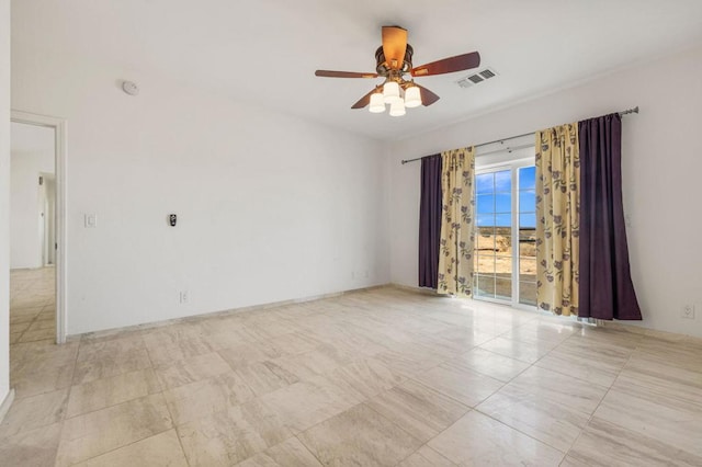 empty room featuring ceiling fan