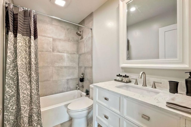 full bathroom featuring toilet, vanity, and shower / bathtub combination with curtain