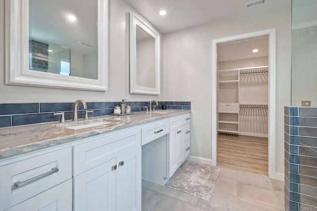 bathroom featuring vanity and wood-type flooring