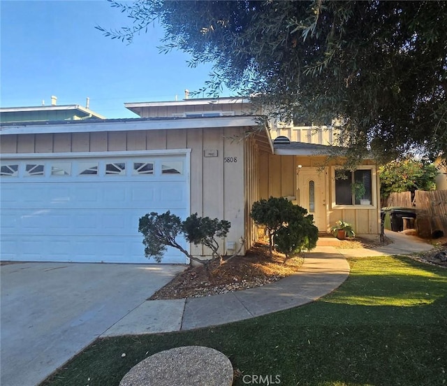 single story home with a garage