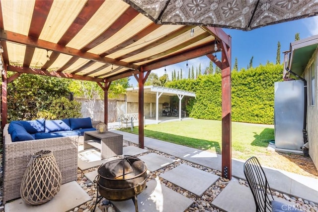 view of patio with a pergola and an outdoor living space with a fire pit