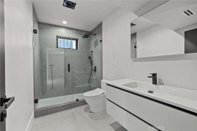 bathroom featuring an enclosed shower, toilet, and vanity