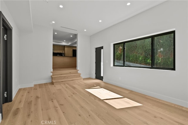 corridor featuring light wood-type flooring