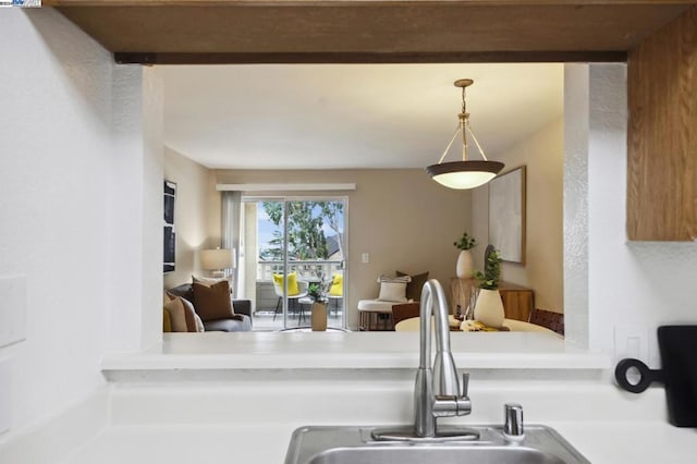 kitchen featuring hanging light fixtures and sink