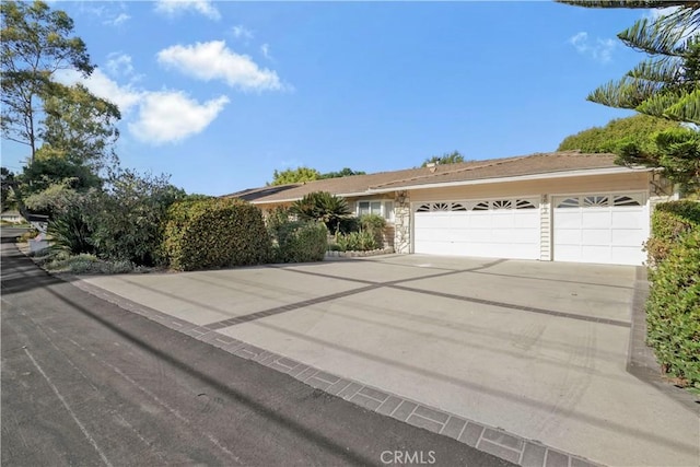 ranch-style home with a garage