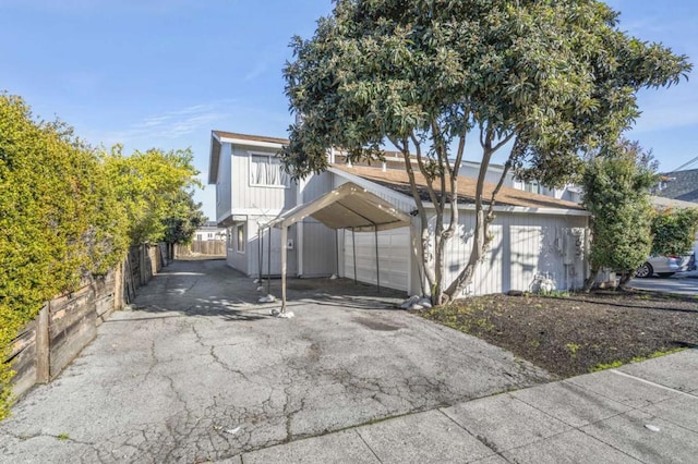 view of front of house with a carport