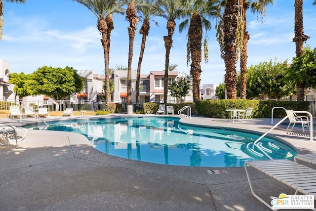 view of pool featuring a patio area