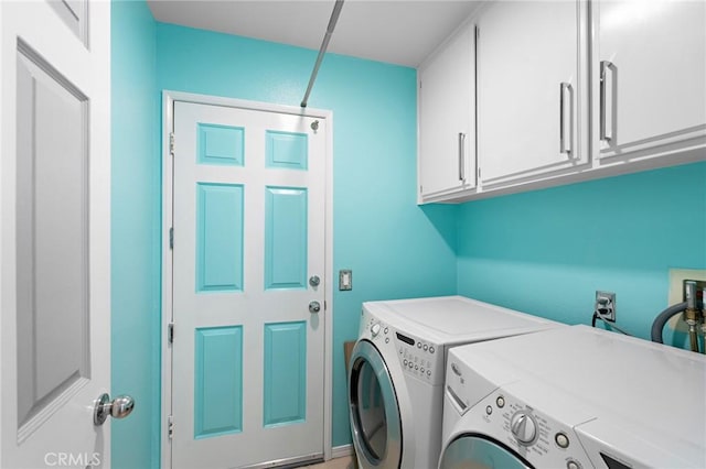20664 Brana Rd, Riverside, CA 92508 - laundry room featuring washer and dryer and cabinet space