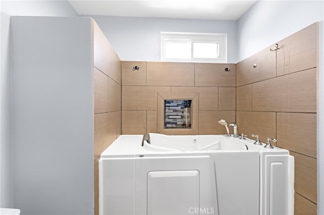 bathroom featuring a bathing tub