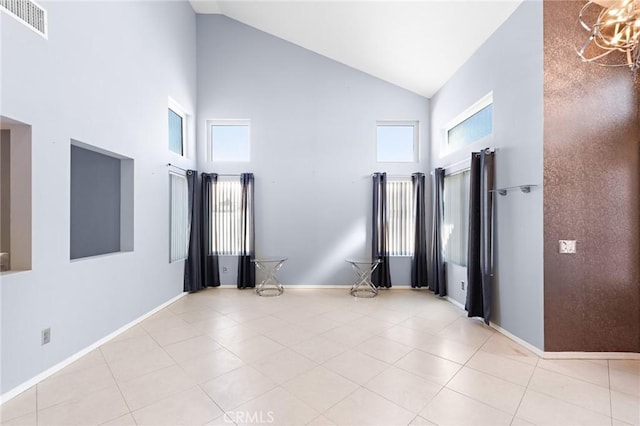 20664 Brana Rd, Riverside, CA 92508 - unfurnished room featuring high vaulted ceiling, light tile patterned flooring, and baseboards