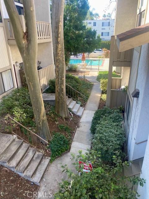 view of yard featuring a pool