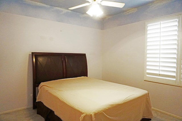 bedroom featuring ceiling fan