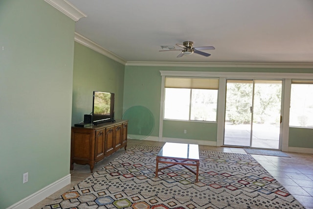 living room with crown molding, light tile patterned flooring, and ceiling fan