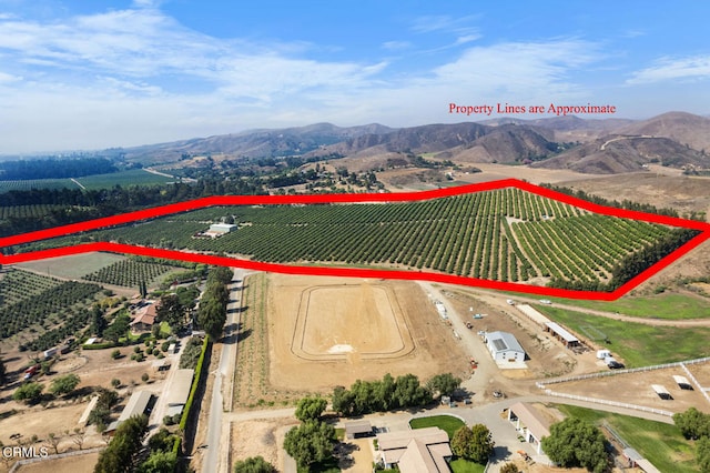 bird's eye view with a mountain view and a rural view