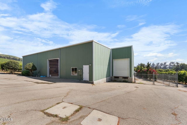 view of outbuilding featuring a garage