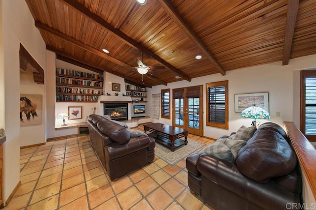 tiled living room with french doors, wooden ceiling, lofted ceiling with beams, and ceiling fan