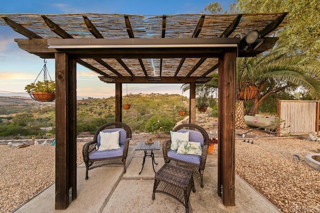 patio terrace at dusk with a pergola