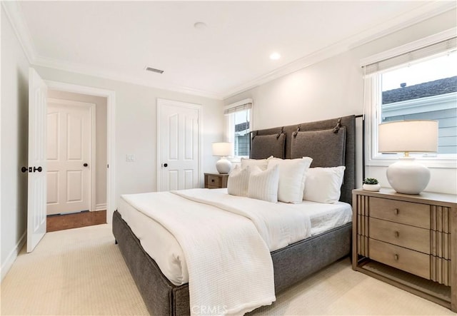 bedroom with crown molding