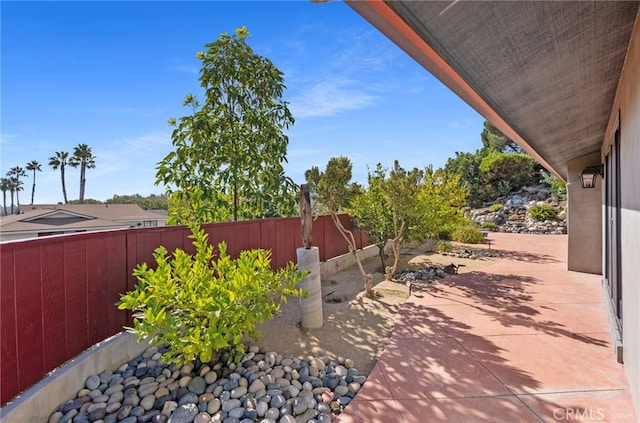 view of patio / terrace with fence