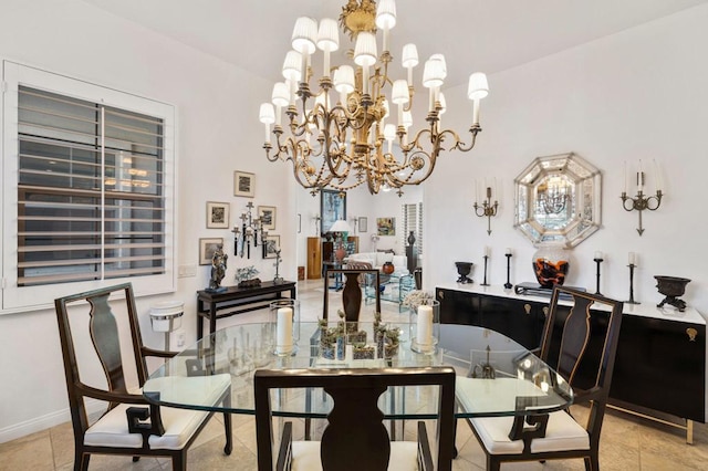 dining area featuring a chandelier