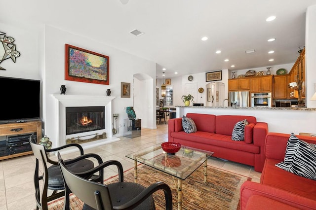 living room with light tile patterned floors