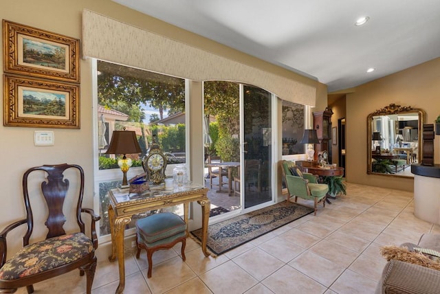 doorway featuring light tile patterned flooring