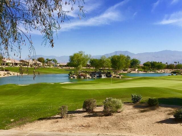 view of home's community featuring a water and mountain view