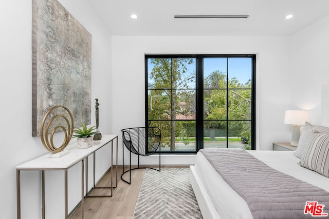 bedroom featuring light hardwood / wood-style flooring