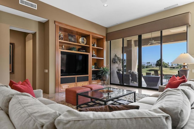 living room featuring ceiling fan