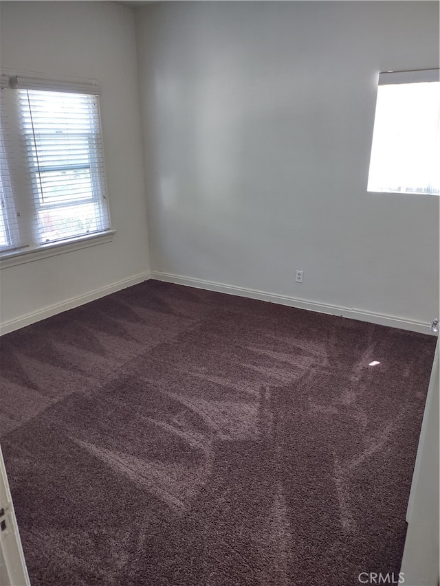 view of carpeted spare room