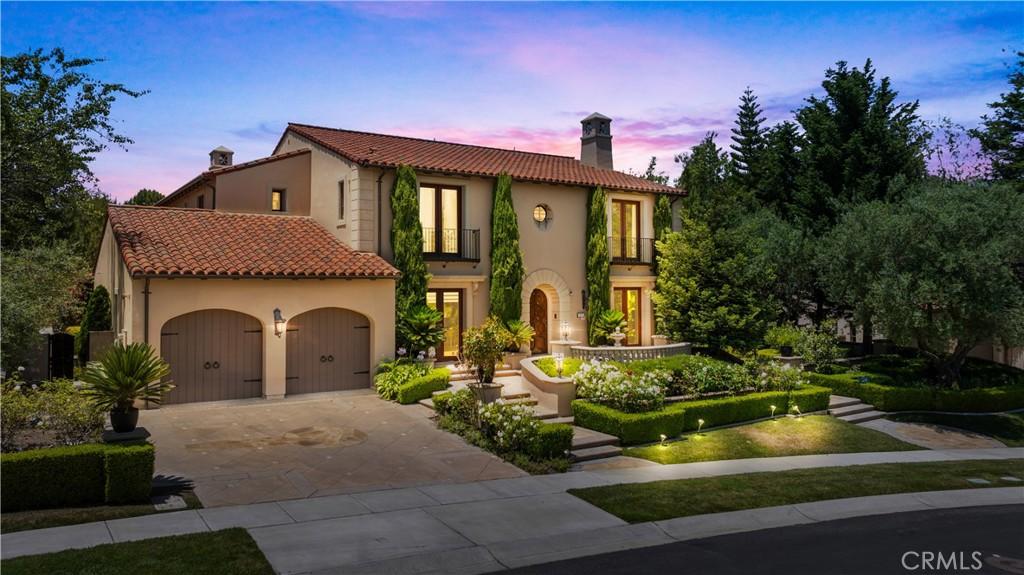 mediterranean / spanish-style house featuring a balcony