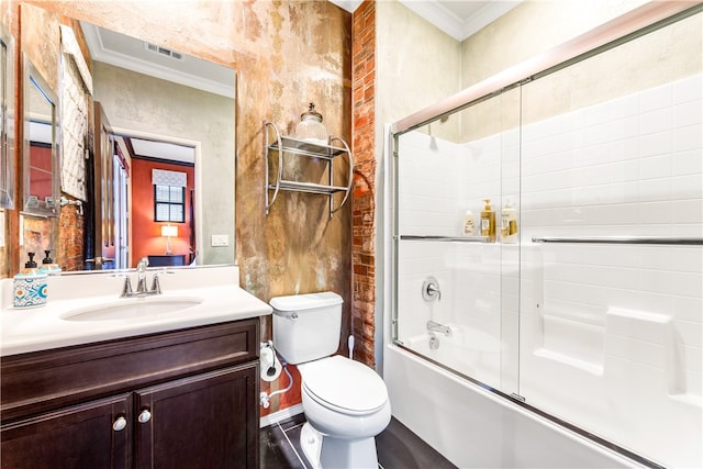 full bathroom with vanity, crown molding, enclosed tub / shower combo, and toilet