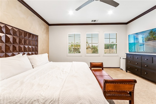 carpeted bedroom with ornamental molding, radiator, and ceiling fan