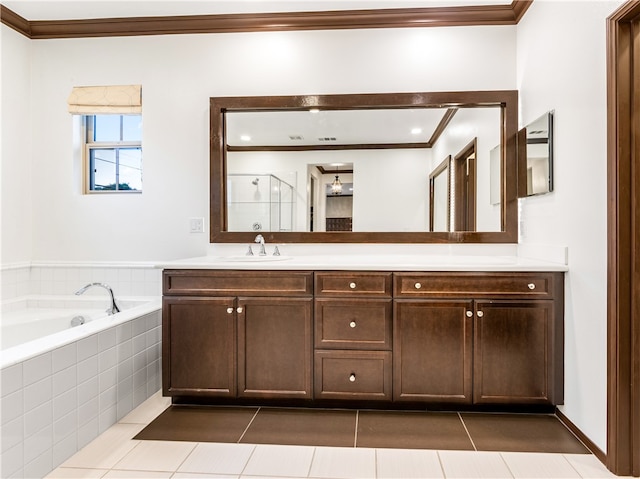 bathroom featuring vanity, crown molding, shower with separate bathtub, and tile patterned floors