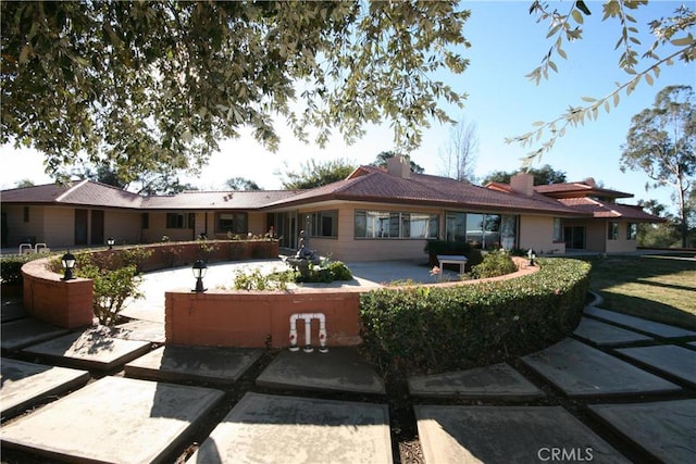 view of front of house featuring a patio