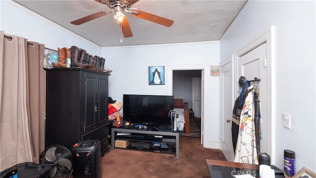 living room with crown molding, dark colored carpet, a textured ceiling, and ceiling fan