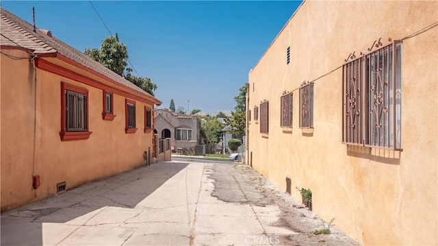 view of side of property featuring a patio