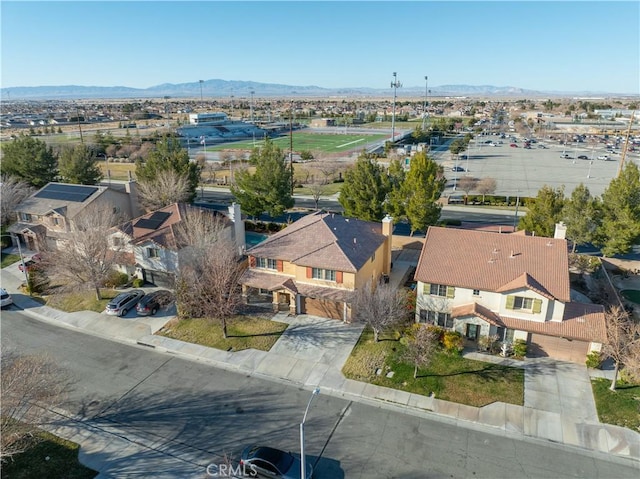 bird's eye view with a residential view and a mountain view