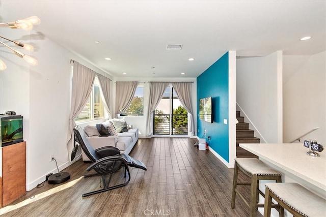 sitting room with dark hardwood / wood-style floors