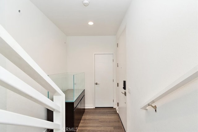 stairway with wood-type flooring