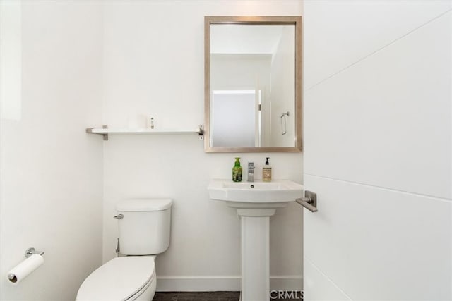 bathroom featuring toilet